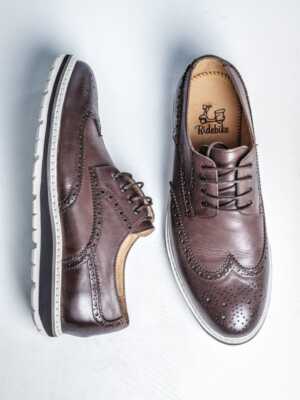 Tienda de Ropa de Hombre Sevilla 3 Zapatos de piel marrón